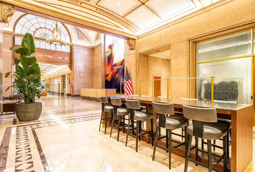 Penn 11 side lobby rest area with bar stools